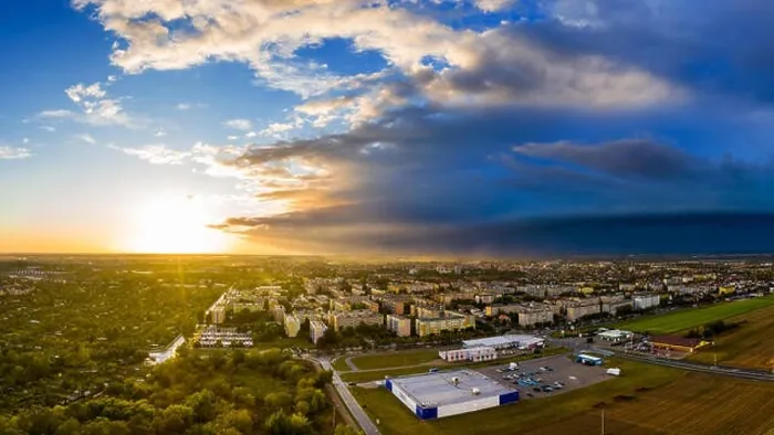 Framed Print : View from above on real estates in Ostrow Wielkopolski in Poland, during dynamic weather Framed Print : View from above on real estates in Ostrow Wielkopolski in Poland, during dynamic weather