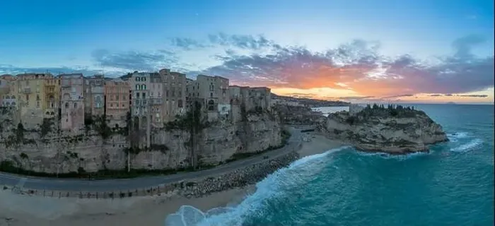 Framed Print : View of Rotonda Beach and the colourful old town of Tropea in Calabria at sunset Framed Print : View of Rotonda Beach and the colourful old town of Tropea in Calabria at sunset