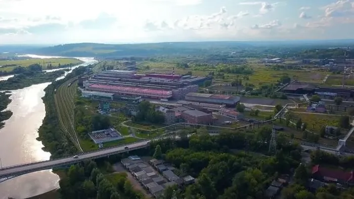 Framed Print : Top view of small factory town by river Framed Print : Top view of small factory town by river
