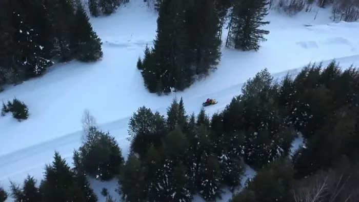 Framed Print : Top view of snowmobile riding in winter forest Framed Print : Top view of snowmobile riding in winter forest