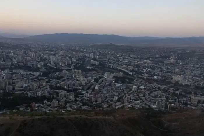 Framed Print : View of Tbilisi City from the mountain, Mtatsminda park, on the sunset Framed Print : View of Tbilisi City from the mountain, Mtatsminda park, on the sunset