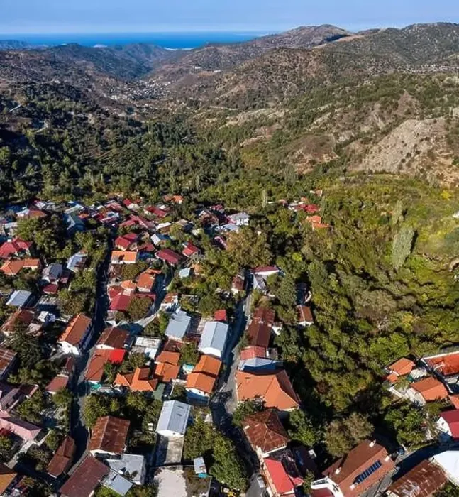 Framed Print : Village of Pedoulas in the Troodos mountains with red roofs nestled in lush green valley overlooking the sea Framed Print : Village of Pedoulas in the Troodos mountains with red roofs nestled in lush green valley overlooking the sea