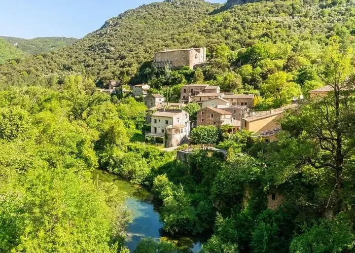 Framed Print : Village on the Vis river, in Hérault, in Occitanie, France Framed Print : Village on the Vis river, in Hérault, in Occitanie, France