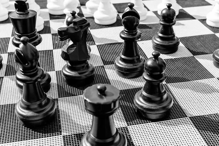 Framed Print : Vintage chessboard close up. Black and white photo Framed Print : Vintage chessboard close up. Black and white photo