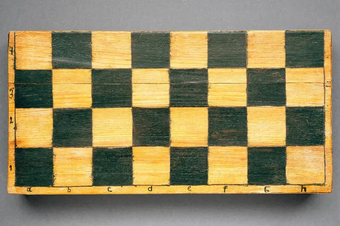 Framed Print : vintage handmade chess box with square pattern on front surface Framed Print : vintage handmade chess box with square pattern on front surface