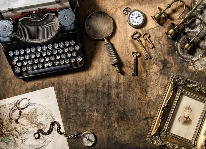 Framed Print : Vintage typewriter and old office accessories on wooden table. Nostalgic still life