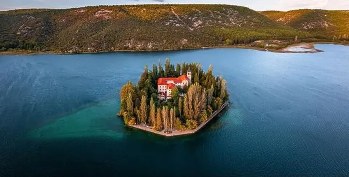 Framed Print : Visovac, Croatia - Aerial panoramic view of Visovac Christian monastery island in Krka National Park on a sunny autumn Framed Print : Visovac, Croatia - Aerial panoramic view of Visovac Christian monastery island in Krka National Park on a sunny autumn