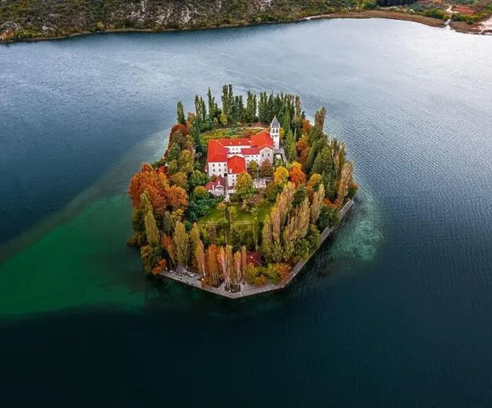 Framed Print : Visovac, Croatia - Aerial view of Visovac Christian monastery in Krka National Park on a bright autumn morning with