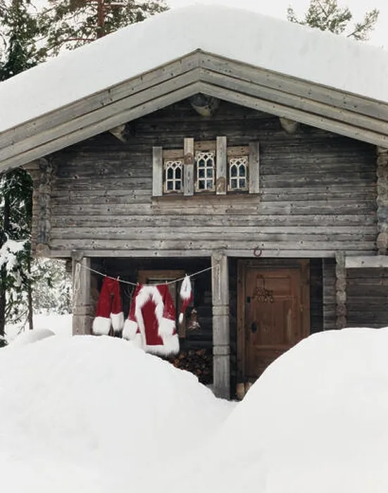 Framed Print : Washing line with Santa Claus clothes hanging outdoors in the snow. Framed Print : Washing line with Santa Claus clothes hanging outdoors in the snow.