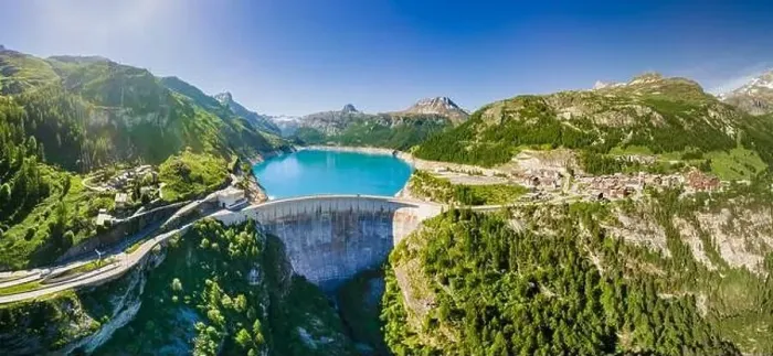 Framed Print : Water dam and reservoir lake aerial panoramic view in French Alps mountains generating hydroelectricity