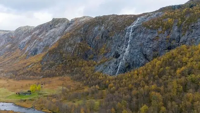 Framed Print : Waterfall Cascading Down Rocky Cliff in Autumn Framed Print : Waterfall Cascading Down Rocky Cliff in Autumn
