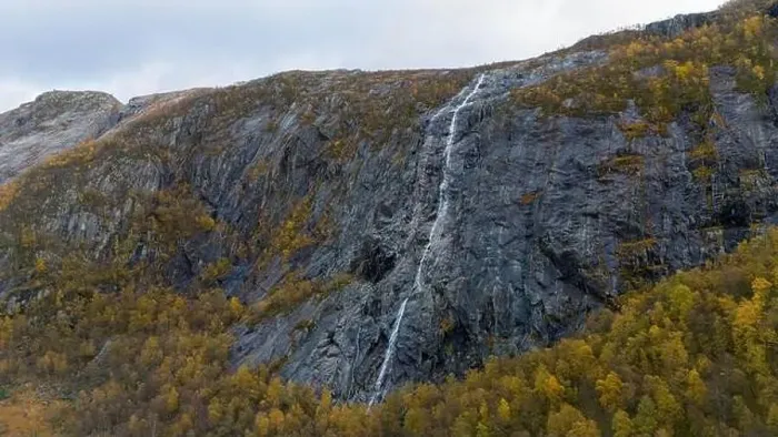 Framed Print : Waterfall Cascading Down Rocky Cliff in Autumn Framed Print : Waterfall Cascading Down Rocky Cliff in Autumn