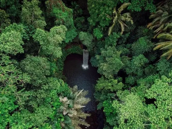 Framed Print : Waterfall in tropical rain forest on Bali island. Aerial drone view Framed Print : Waterfall in tropical rain forest on Bali island. Aerial drone view