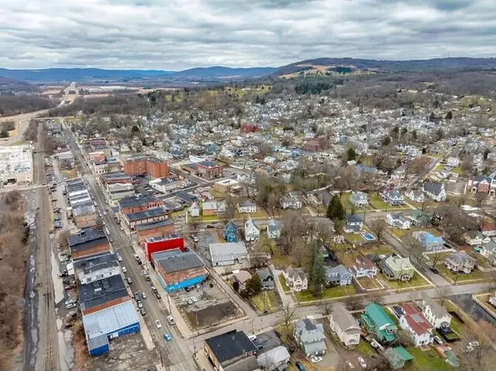 Framed Print : Waverly, NY, USA - 03-03-2024 - Cloudy winter aerial image of the downtown area in the Village of Waverly, NY Framed Print : Waverly, NY, USA - 03-03-2024 - Cloudy winter aerial image of the downtown area in the Village of Waverly, NY