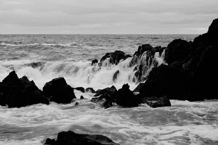 Framed Print : Waves cascade over dark volcanic rocks in a mesmerizing flow at Porto Moniz natural pools Framed Print : Waves cascade over dark volcanic rocks in a mesmerizing flow at Porto Moniz natural pools