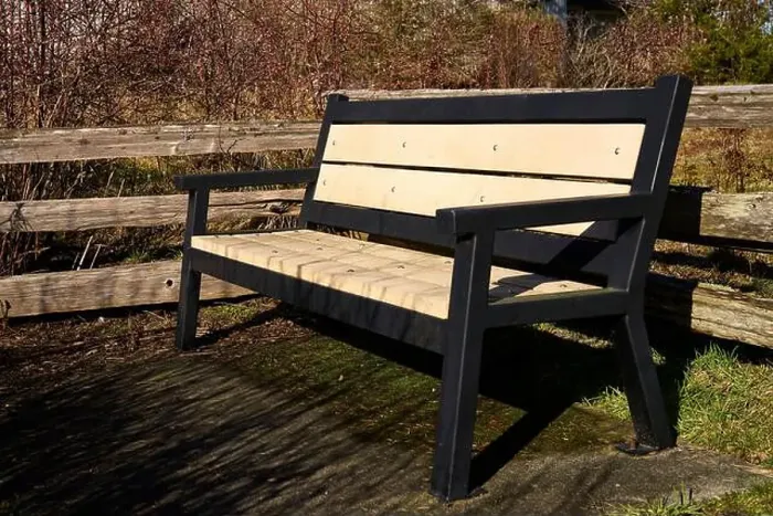 Framed Print : A welcoming park bench with wooden railings and dried fall bushes in the background Framed Print : A welcoming park bench with wooden railings and dried fall bushes in the background
