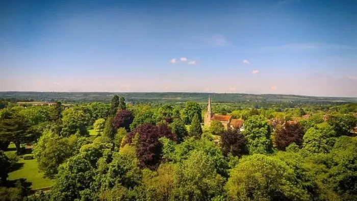 Framed Print : West Malling Church surrounded by woods and trees in full bloom with copy space, ideal for advertising Framed Print : West Malling Church surrounded by woods and trees in full bloom with copy space, ideal for advertising