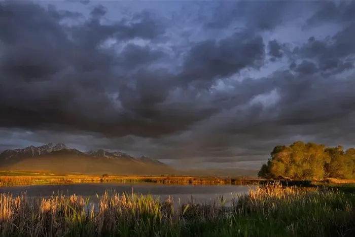 Framed Print : Wetlands pond reflects the Mission Mountains at sunset at the Ninepipe National Wildlife Refuge near Ronan Framed Print : Wetlands pond reflects the Mission Mountains at sunset at the Ninepipe National Wildlife Refuge near Ronan