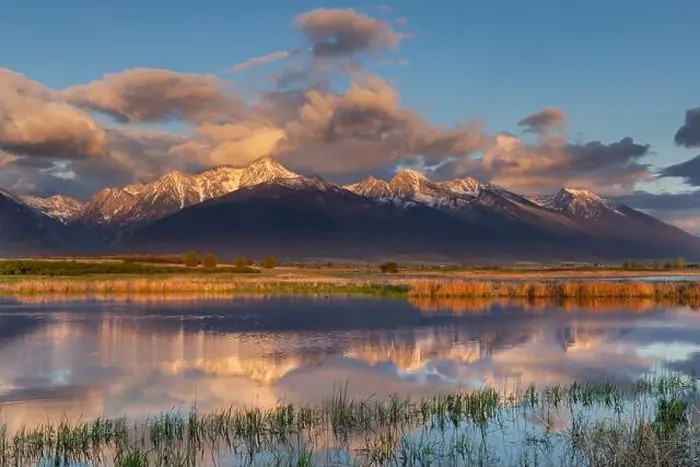 Framed Print : Wetlands pond reflects the Mission Mountains at sunset at Ninepipe National Wildlife Refuge near Ronan, Montana, USA Framed Print : Wetlands pond reflects the Mission Mountains at sunset at Ninepipe National Wildlife Refuge near Ronan, Montana, USA