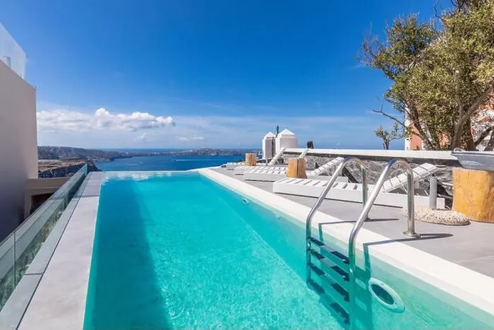 Framed Print : White architecture on Santorini island, Greece. Luxury infinity pool with sea view. Summer romantic wedding honeymoon destination. Couple retreat Framed Print : White architecture on Santorini island, Greece. Luxury infinity pool with sea view. Summer romantic wedding honeymoon destination. Couple retreat