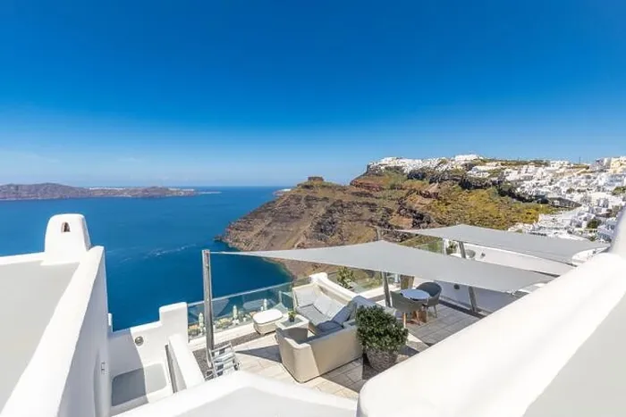 Framed Print : White architecture on Santorini island, Greece. Beautiful landscape, sea view. White wash staircases on Santorini Island, Greece. The view off Caldera