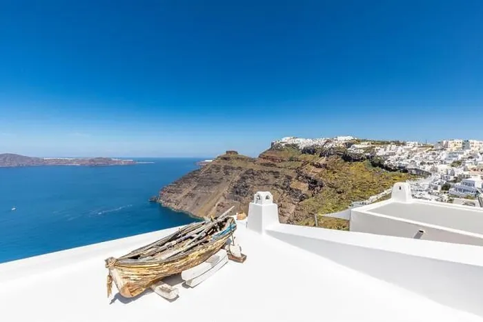 Framed Print : White architecture on Santorini island, Greece. Beautiful landscape, sea view. White wash staircases on Santorini Island, Greece. The view off Caldera Framed Print : White architecture on Santorini island, Greece. Beautiful landscape, sea view. White wash staircases on Santorini Island, Greece. The view off Caldera