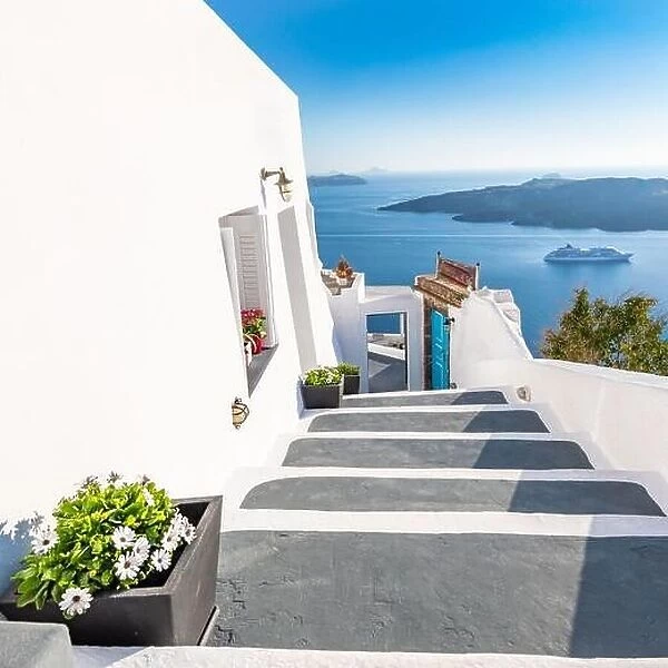White architecture staircases on Santorini Island, Greece. View toward Caldera sea with cruise ship awaiting. Amazing landscape, summer holiday travel