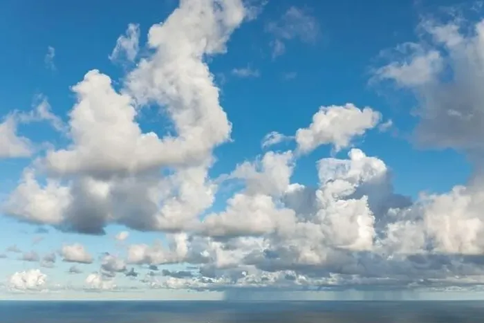 Framed Print : White clouds in the sky and rain in the sea Framed Print : White clouds in the sky and rain in the sea