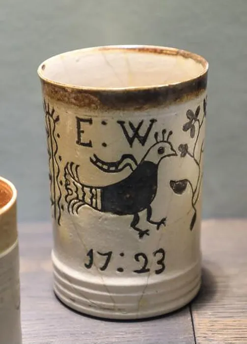 Framed Print : A white dipped earthenware tankard from 1723 on display at the Potteries Museum and Art Gallery Framed Print : A white dipped earthenware tankard from 1723 on display at the Potteries Museum and Art Gallery