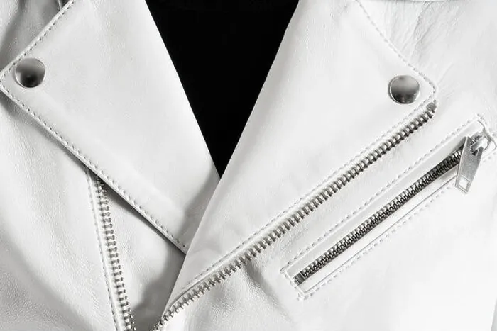 Framed Print : White leather jacket with metallic zippers and stitched pocket. Detailed closeup texture Framed Print : White leather jacket with metallic zippers and stitched pocket. Detailed closeup texture