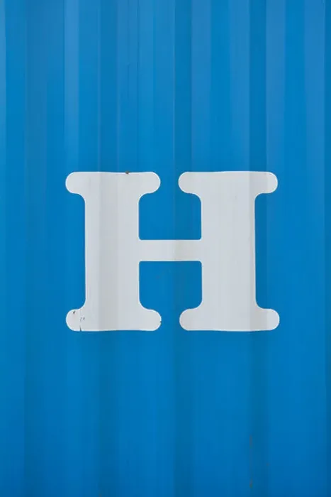 Framed Print : White letter H on blue background Framed Print : White letter H on blue background