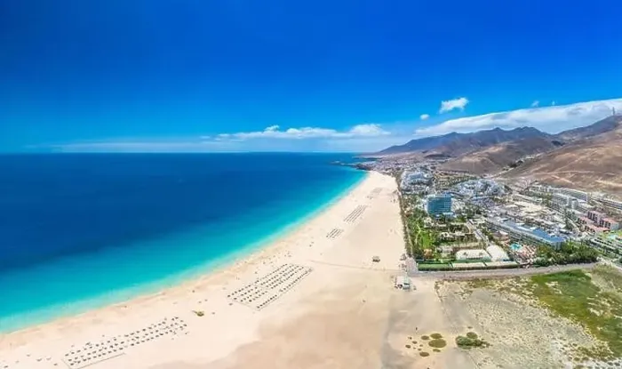 Framed Print : White sandy beach and blue water in Morro Jable, south of Fuerteventura, Canary islands, Spain Framed Print : White sandy beach and blue water in Morro Jable, south of Fuerteventura, Canary islands, Spain