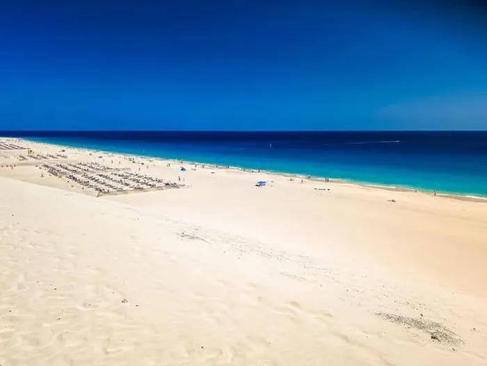 Framed Print : White sandy beach and blue water in Morro Jable, south of Fuerteventura, Canary islands, Spain Framed Print : White sandy beach and blue water in Morro Jable, south of Fuerteventura, Canary islands, Spain