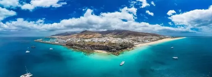 Framed Print : White sandy beach and blue water in Morro Jable, south of Fuerteventura, Canary islands, Spain Framed Print : White sandy beach and blue water in Morro Jable, south of Fuerteventura, Canary islands, Spain