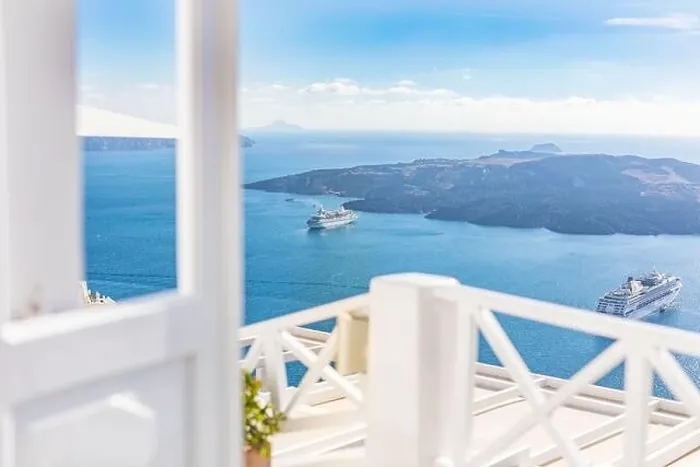 Framed Print : White wash staircases on Santorini Island, Greece. The view toward Caldera sea with cruise ship awaiting. Luxury summer travel, dream vacation Framed Print : White wash staircases on Santorini Island, Greece. The view toward Caldera sea with cruise ship awaiting. Luxury summer travel, dream vacation