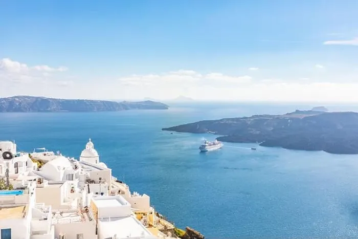 Framed Print : White wash staircases on Santorini Island, Greece. The view toward Caldera sea with cruise ship awaiting. Luxury summer travel, dream vacation Framed Print : White wash staircases on Santorini Island, Greece. The view toward Caldera sea with cruise ship awaiting. Luxury summer travel, dream vacation