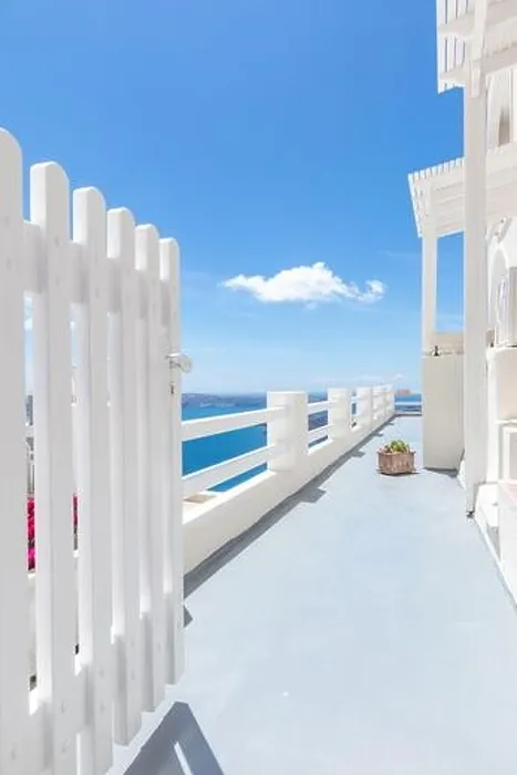 Framed Print : White wash staircases on Santorini Island Greece. Door entrance over blue sea view under blue sky. Amazing summer travel landscape. Exotic destination Framed Print : White wash staircases on Santorini Island Greece. Door entrance over blue sea view under blue sky. Amazing summer travel landscape. Exotic destination