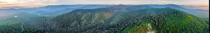 Framed Print : Wide aerial panorama of forested hills and mountains at sunset near Marysville, Victoria, Australia Framed Print : Wide aerial panorama of forested hills and mountains at sunset near Marysville, Victoria, Australia