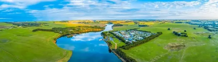Framed Print : Wide aerial panorama of Hopkins River, Holiday Park and surrounding agricultural land in Warrnambool, Australia Framed Print : Wide aerial panorama of Hopkins River, Holiday Park and surrounding agricultural land in Warrnambool, Australia