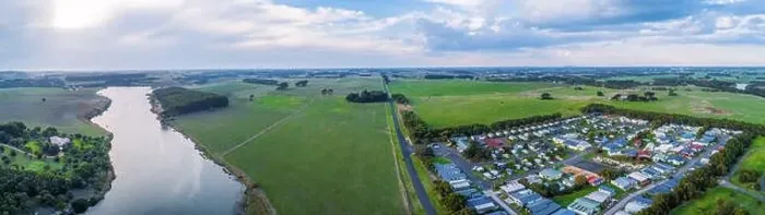 Framed Print : Wide aerial panorama of Hopkins River, Holiday Park and grasslands in Warrnambool, Australia