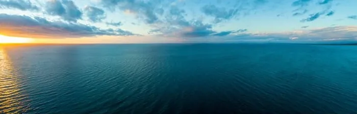 Framed Print : Wide aerial panorama of sunset over ocean - minimalistic seascape Framed Print : Wide aerial panorama of sunset over ocean - minimalistic seascape