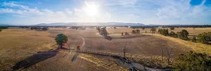 Framed Print : Wide aerial panoramic landscape of Australian outback at sunset with lens flare Framed Print : Wide aerial panoramic landscape of Australian outback at sunset with lens flare