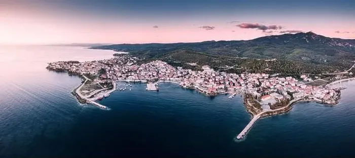 Framed Print : Wide aerial panoramic sunset view of a resort sea town Neos Marmaras in Halkidiki Framed Print : Wide aerial panoramic sunset view of a resort sea town Neos Marmaras in Halkidiki
