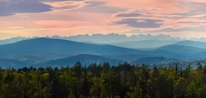 Framed Print : Wide angle panorama autumn forest, misty hills mountain tops in pink dawn