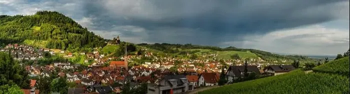 Framed Print : Wide hires panoramic landscape view of green valley in Schwartzwald. Green hills with vineyards and old medieval castle Framed Print : Wide hires panoramic landscape view of green valley in Schwartzwald. Green hills with vineyards and old medieval castle
