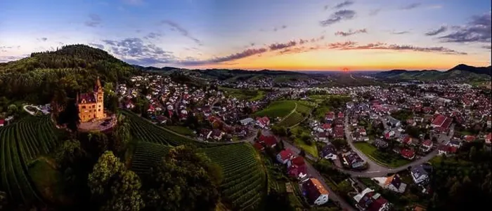 Framed Print : Wide hires panoramic landscape view of green valley in Schwartzwald at sunset. Beautiful sky and evening in the village Framed Print : Wide hires panoramic landscape view of green valley in Schwartzwald at sunset. Beautiful sky and evening in the village