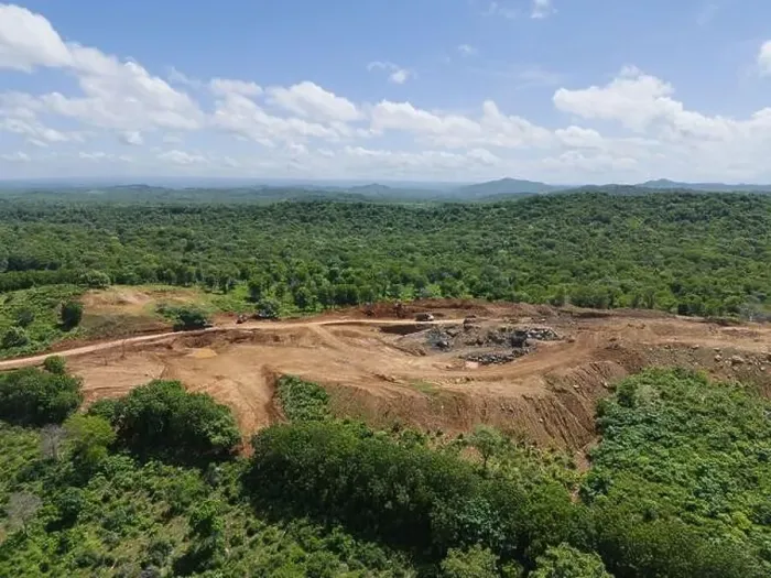 Framed Print : Wide mine quarry on green natural landscape aerial drone view on sunny day Framed Print : Wide mine quarry on green natural landscape aerial drone view on sunny day