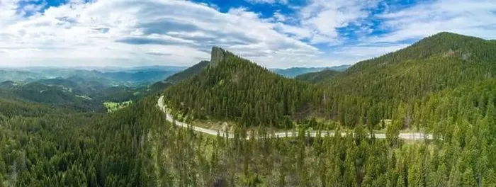 Framed Print : Winding track is like slopes of Rhodope Mountains with forests. Panorama, top view Framed Print : Winding track is like slopes of Rhodope Mountains with forests. Panorama, top view