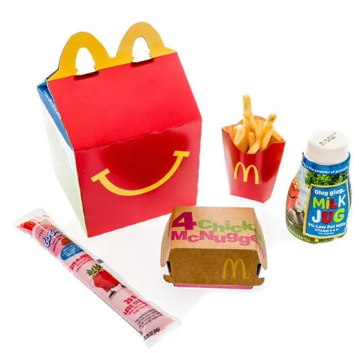 Framed Print : Winneconne, WI - 7 August 2018: A Chicken McNuggets happy meal with white milk and yogurt on an isolated background Framed Print : Winneconne, WI - 7 August 2018: A Chicken McNuggets happy meal with white milk and yogurt on an isolated background