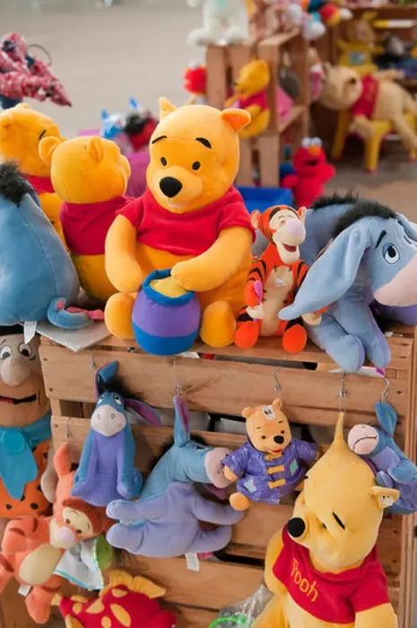 Framed Print : Winnie the Pooh toys for sale at a local market Framed Print : Winnie the Pooh toys for sale at a local market
